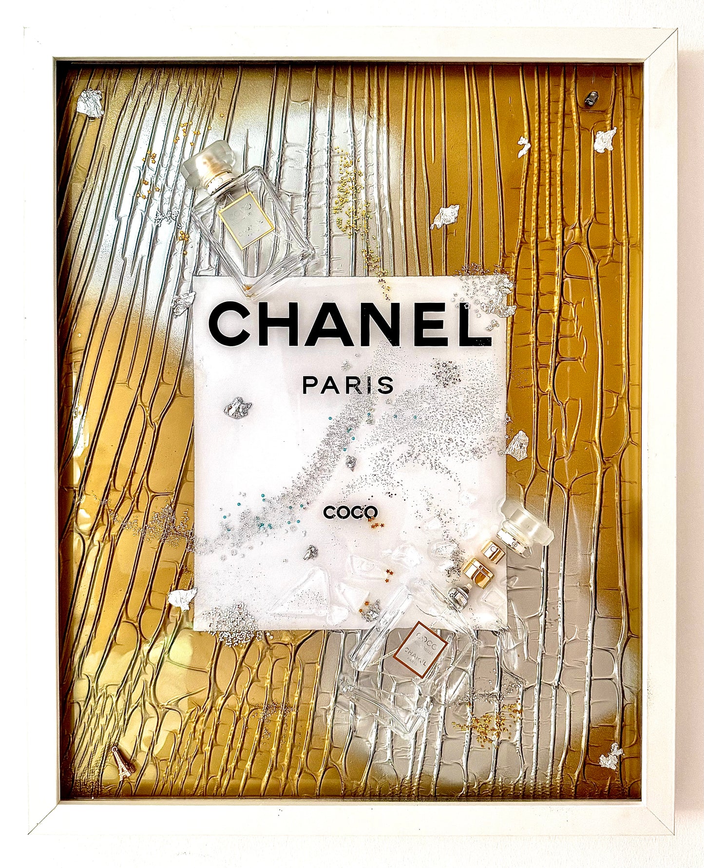 Coco Chanel Twin bottles, fractured